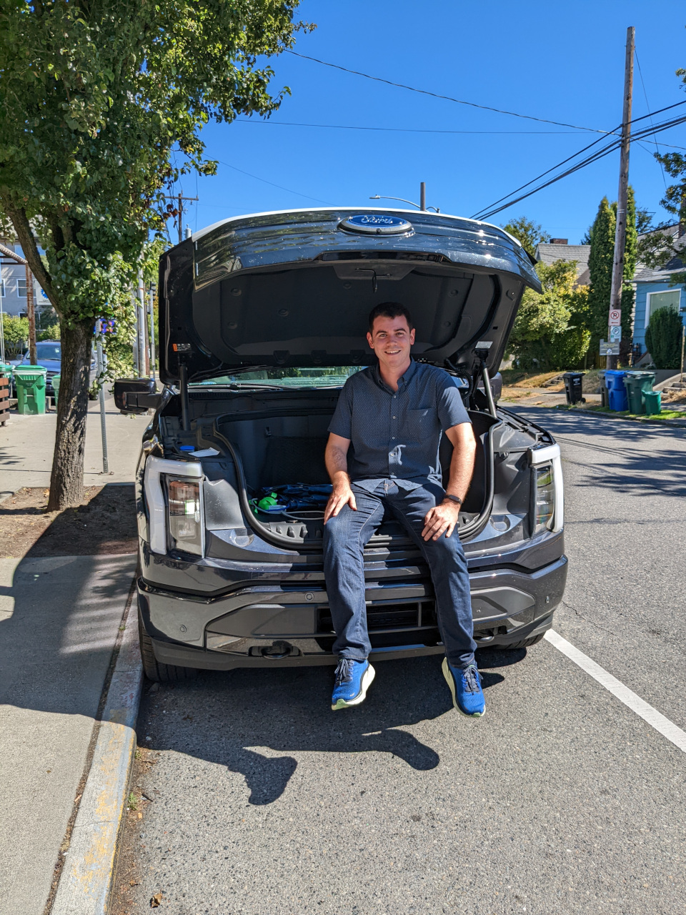 Me in the frunk of an F-150 Lightning